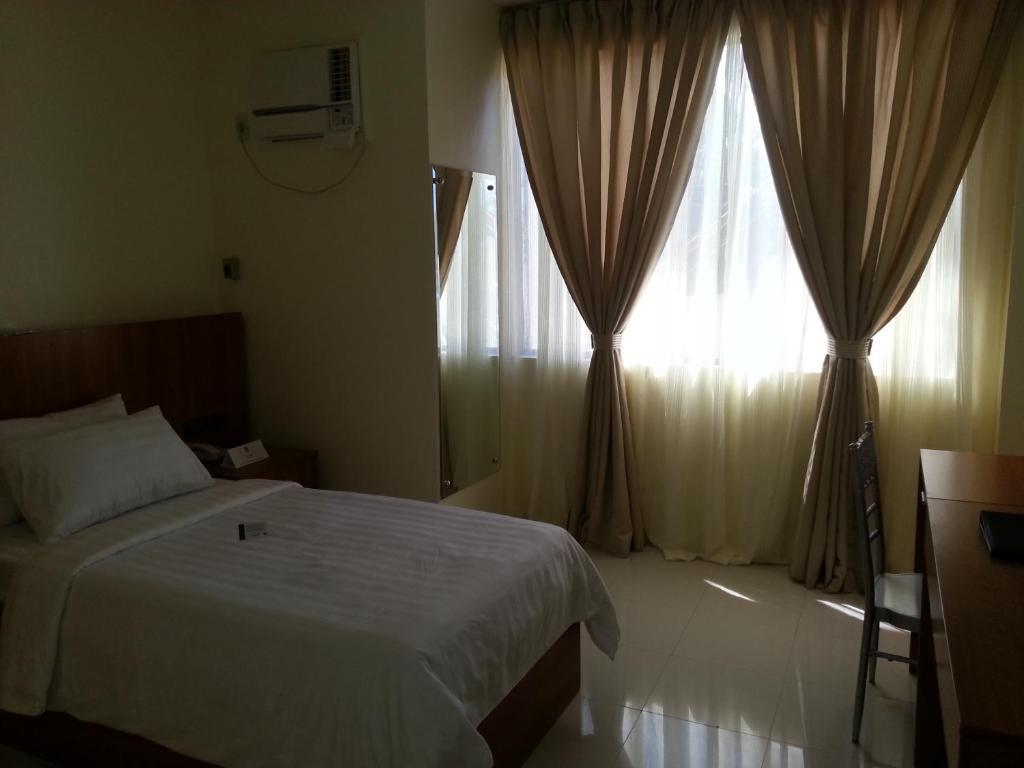 Parkway Hotel Surigao Pokoj fotografie